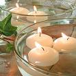 Floating  wedding candles centrepiece table.jpg